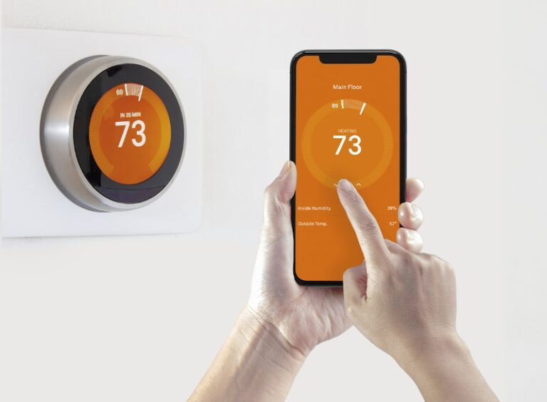 Orange Smart Thermostat Controlled By Smart Phone App